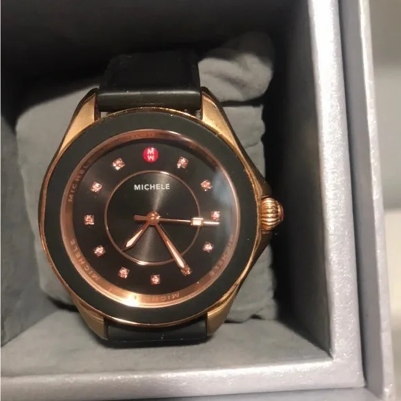 Only worn a few times. Black and rose gold with diamonds